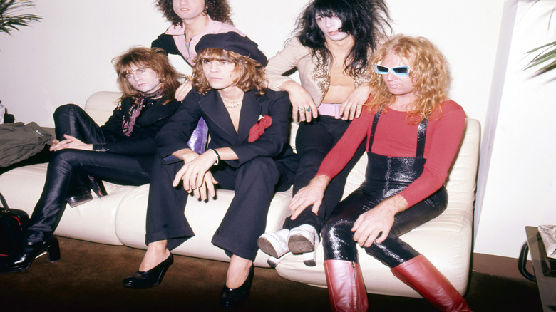 New York Dolls sitting on a white sofa