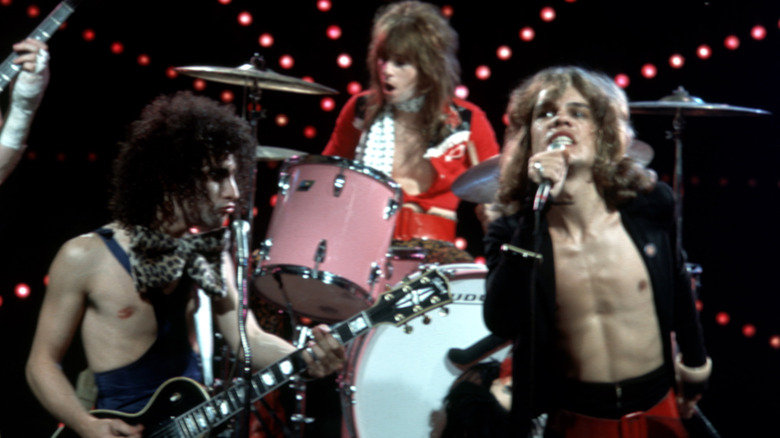 The New York Dolls performing on stage