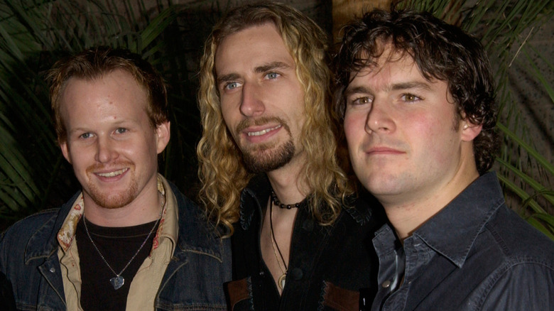 nickelback members smiling 