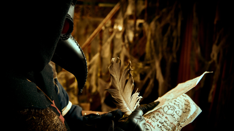 Plague doctor checking notes