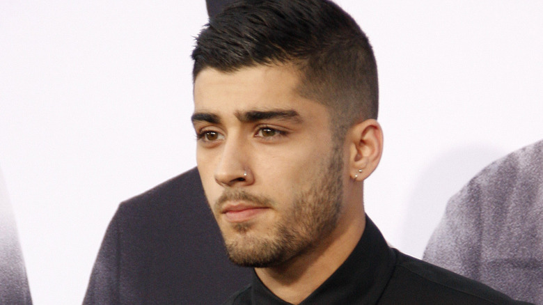 zayn malik concerned looking away