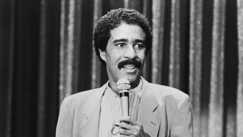 Richard Pryor onstage with microphone