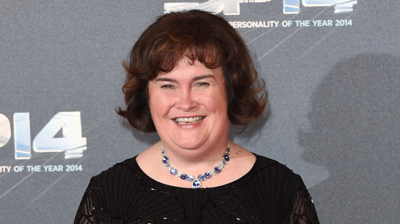 susan boyle smiling black dress silver necklace