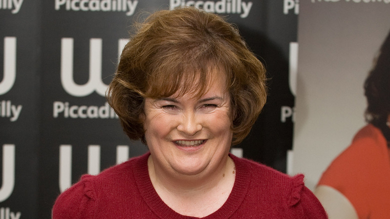 susan boyle grinning red sweater