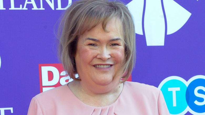 susan boyle smiling pink dress rosy cheeks