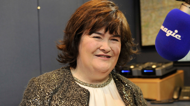 susan boyle smiling by radio microphone