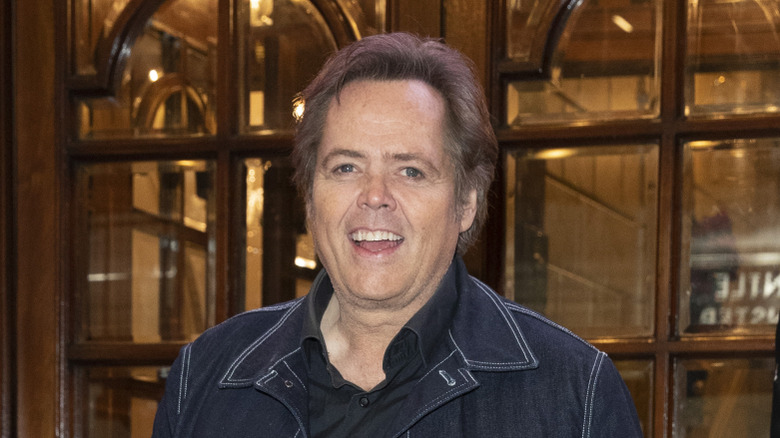 jimmy osmond smiles and leaves a theater