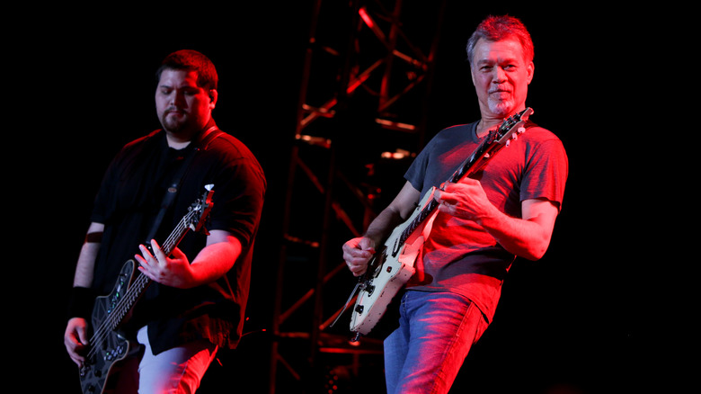 Wolfgang and Eddie Van Halen onstage with instruments