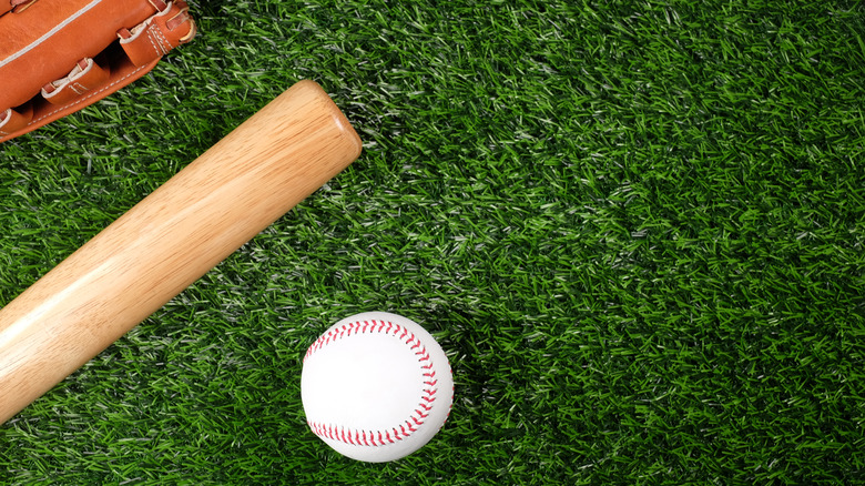 baseball equipment on grass