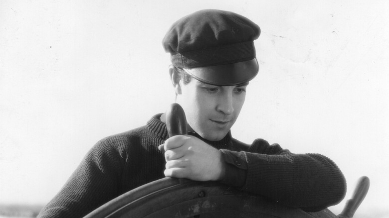 ramon novarro at a ship wheel