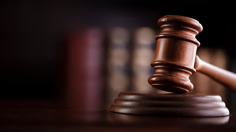 gavel with courtroom in background