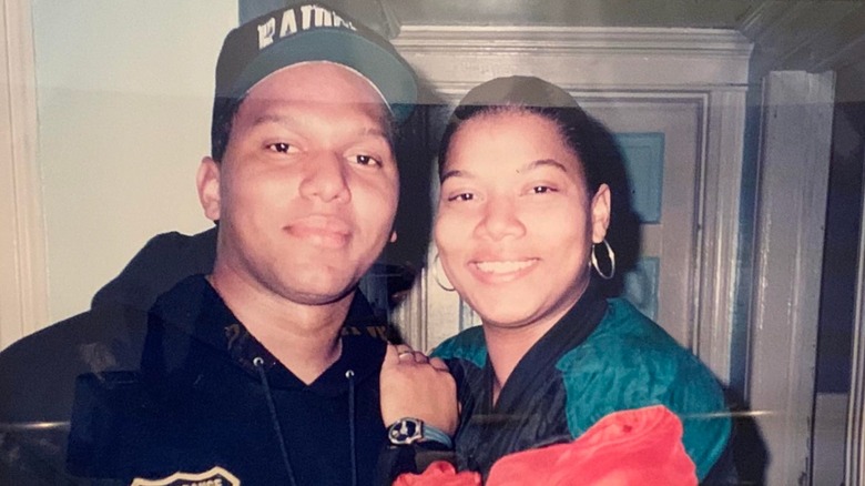 Queen Latifah and her brother smiling