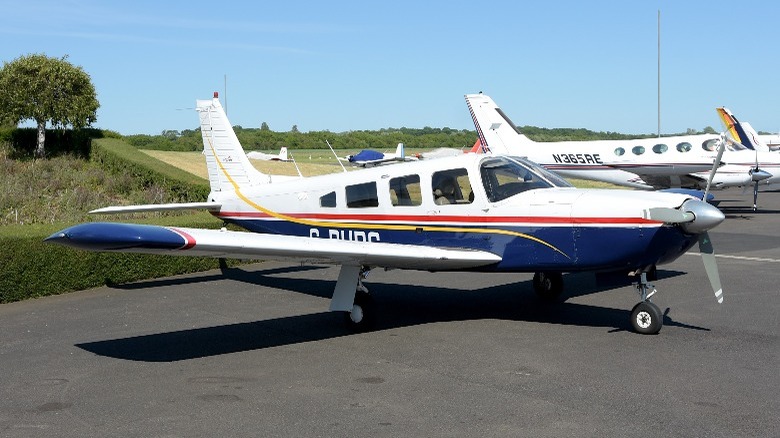 Piper Saratoga plane parked