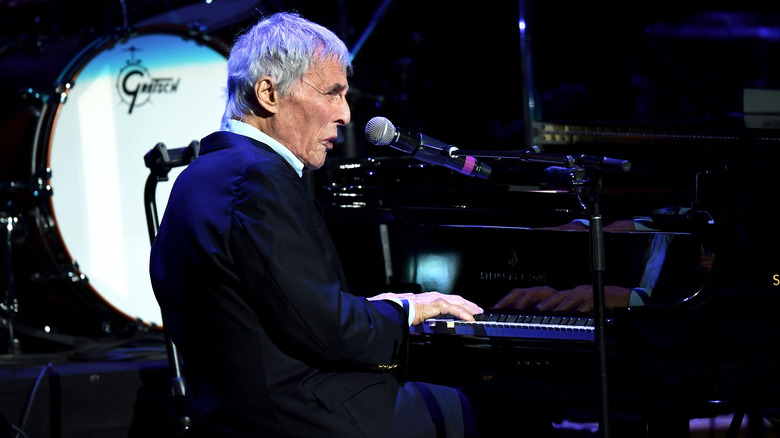 Burt Bacharach playing piano