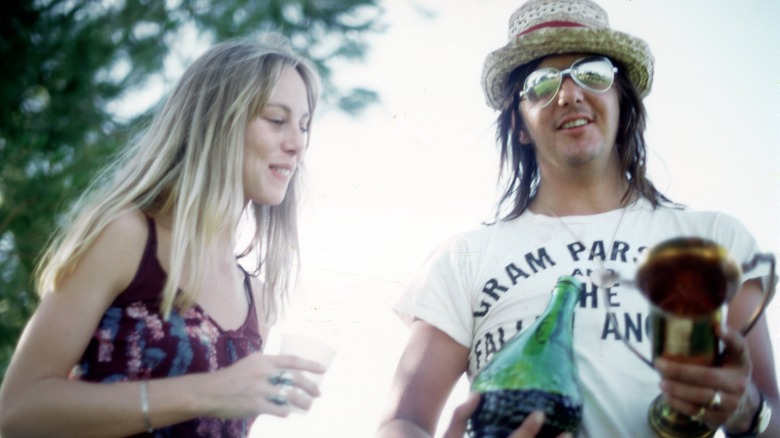 Gram Parsons with blonde woman