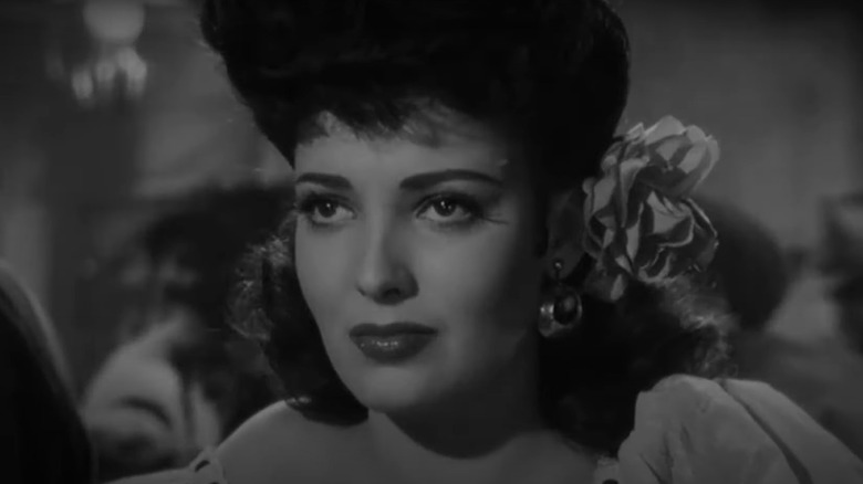 Linda Darnell smirking