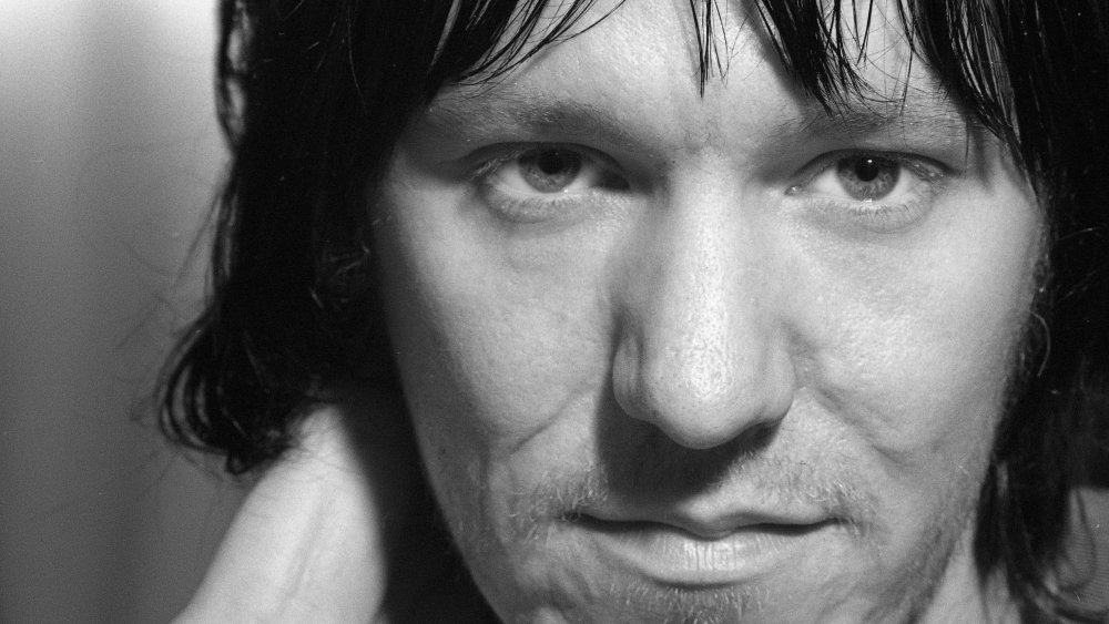 Extreme close view of Elliott Smith's face, especially his nose