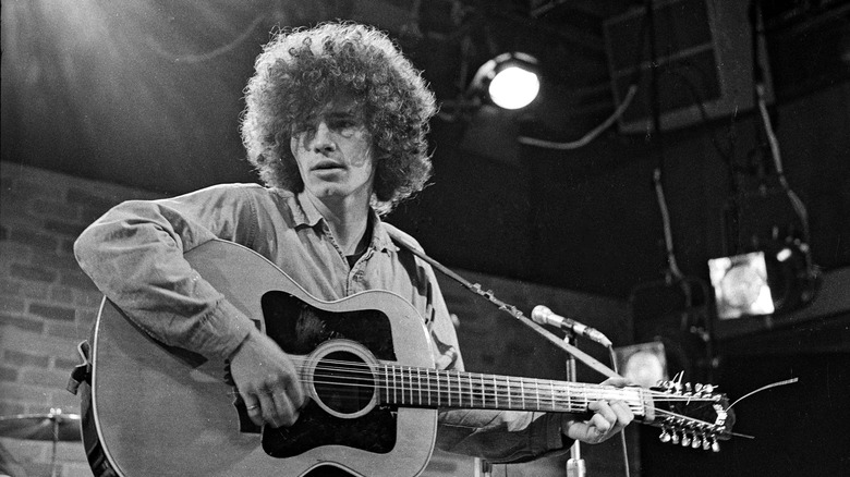 Tim Buckley on stage performing 