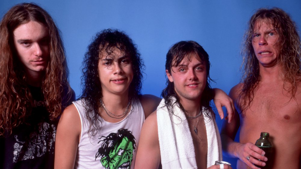 A young Metallica - Cliff Burton on the left - poses for a photo shoot