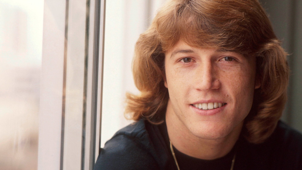 Red hair Andy Gibb smiling