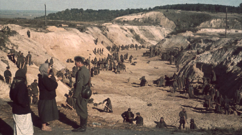 Soviet POWs covering massacre