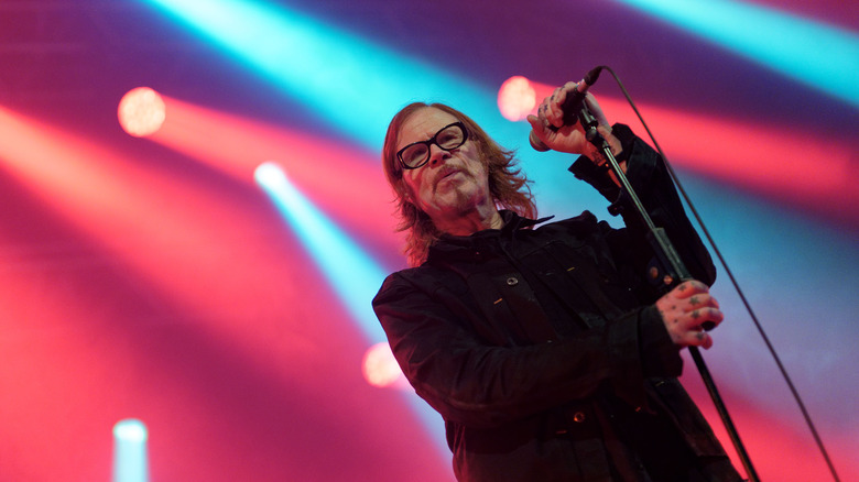 Mark Lanegan holding microphone