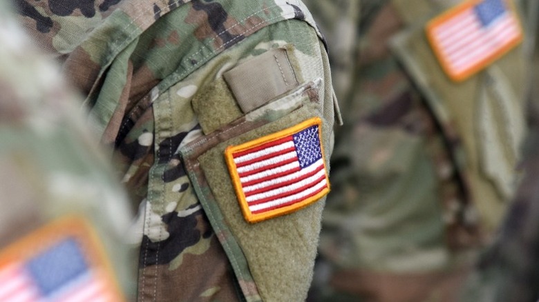 American soldiers with patch of US flag