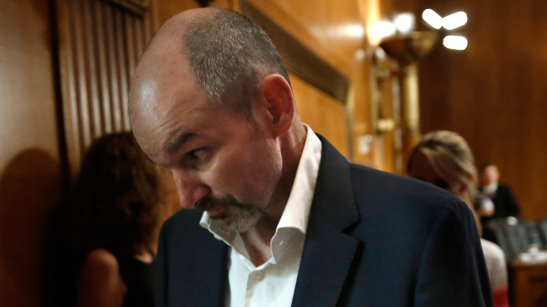 Kevin Turner leaves a Congressional hearing