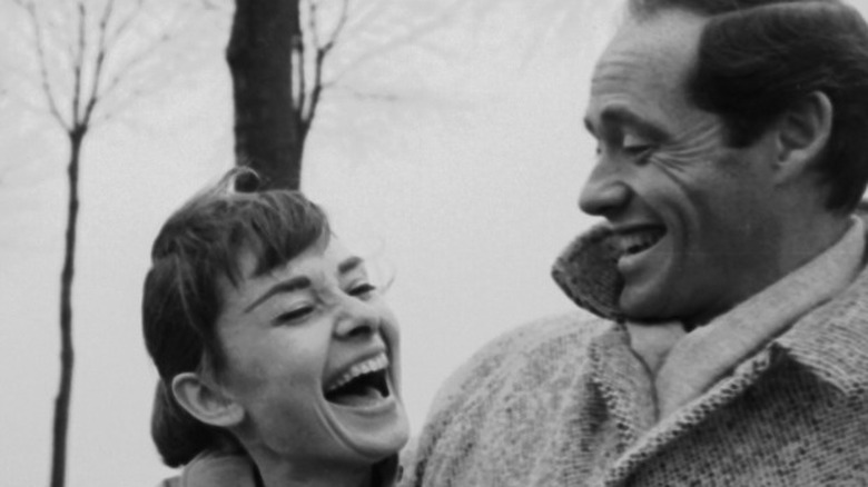 Audrey Hepburn and Mel Ferrer laughing