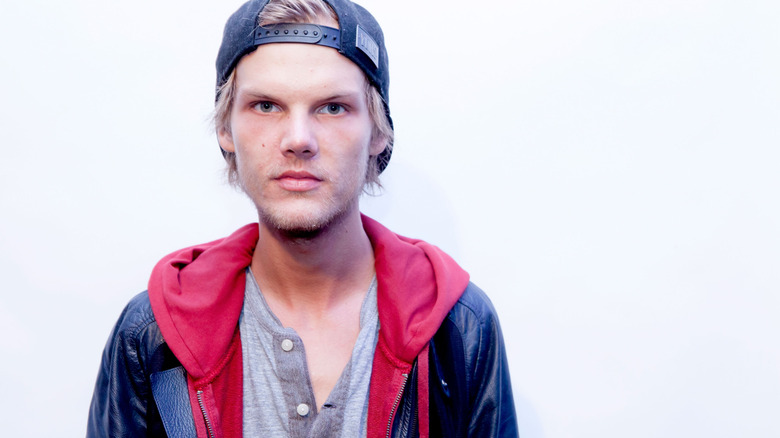 Tim Bergling Avicii white wall