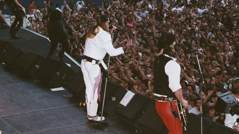 Guns N Roses performing on stage to crowd