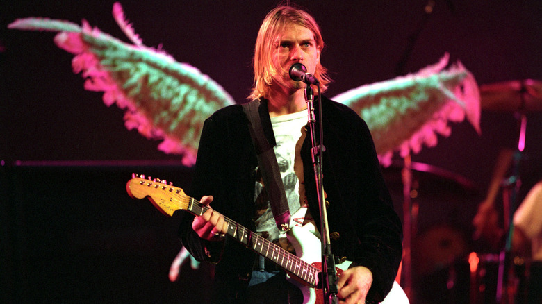 Kurt Cobain black jacket guitar performing