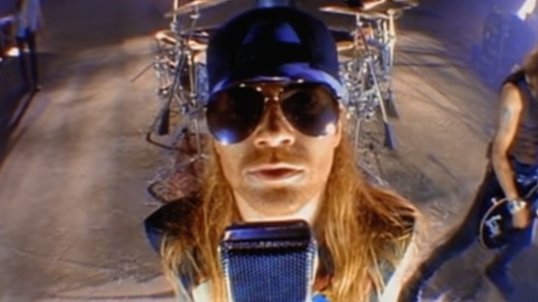 axl rose sunglasses mic music video