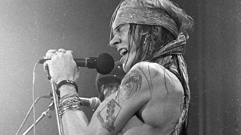 Axl Rose performing on stage