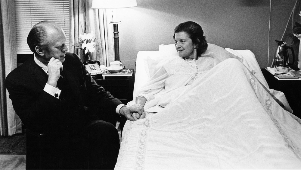 Betty and Gerald Ford hold hands after her cancer surgery