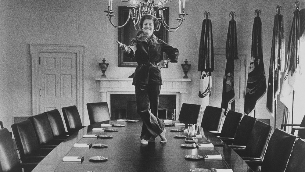 First Lady Betty Ford dancing on cabinet table in 1977