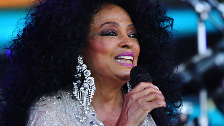 Diana Ross performing mic dangling earrings