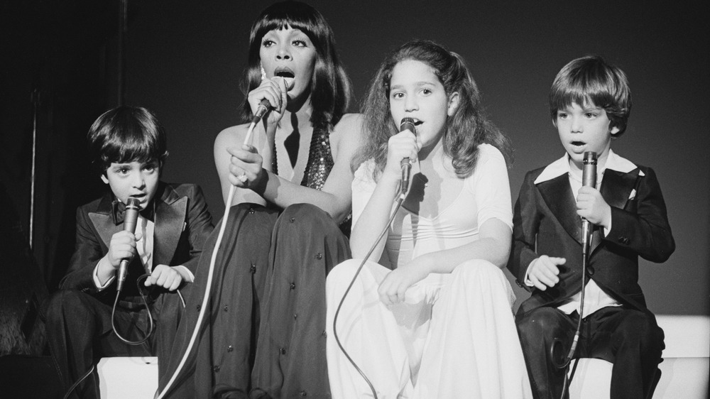  Donna Summer performing with children