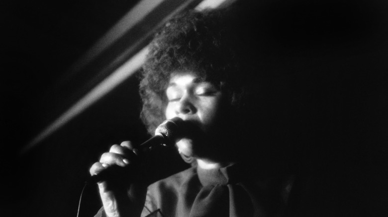 Etta James singing black and white photo