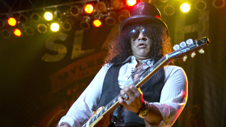 Slash playing guitar