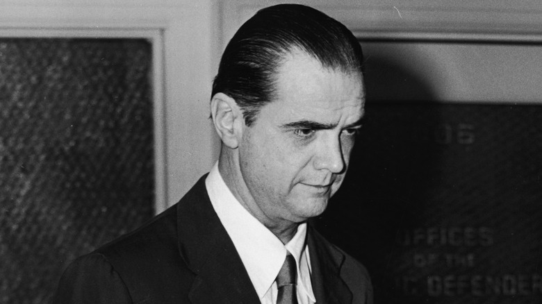 Howard Hughes with his hair slicked back