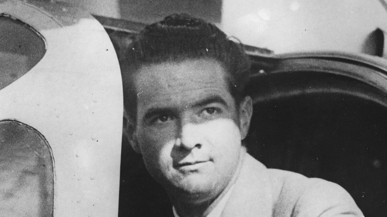 Howard Hughes sits inside a plane