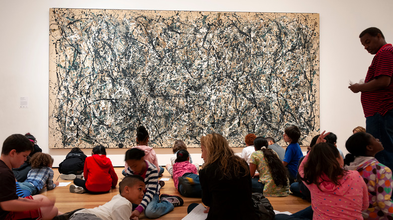 Children with Jackson Pollock painting