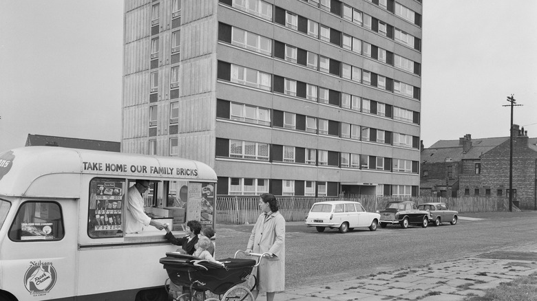 A look at a Manchester street in the '60s, woman pushing stroller