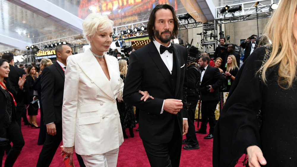 keanu reeves walking carpet with mother