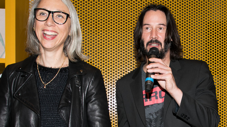 keanu reeves and alexandra grant smiling