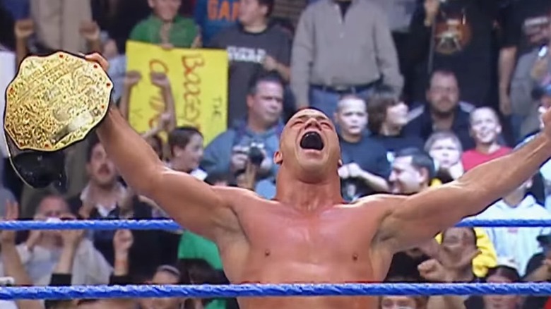 Kurt Angle holding up the World Heavyweight Championship in WWE