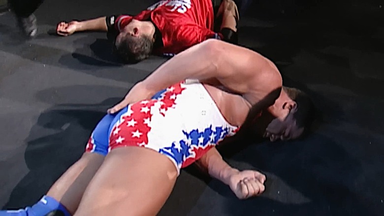 Kurt Angle holding his tailbone at the King of the Ring 2001