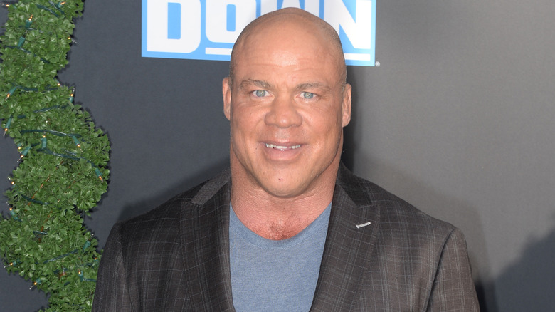 Kurt Angle smiling while backstage at WWE Smackdown in 2019