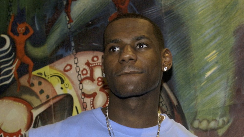 LeBron James blue shirt necklace looking up